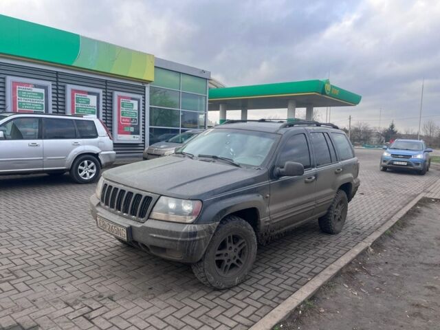 Серый Джип Гранд Чероки, объемом двигателя 4 л и пробегом 385 тыс. км за 3500 $, фото 1 на Automoto.ua