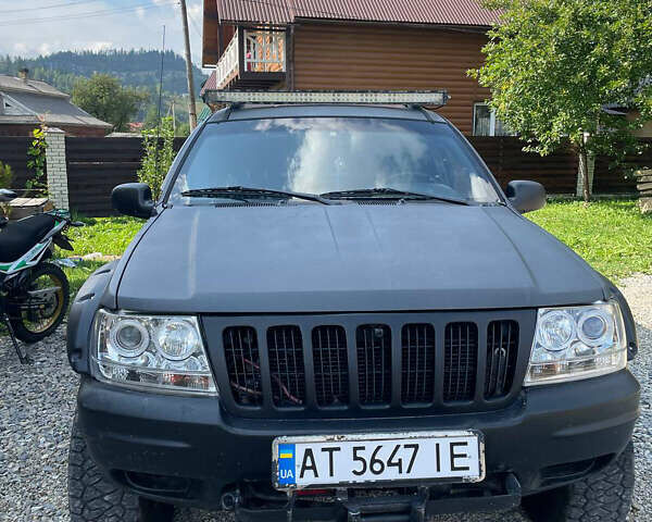 Сірий Джип Grand Cherokee, об'ємом двигуна 4.7 л та пробігом 410 тис. км за 7000 $, фото 1 на Automoto.ua