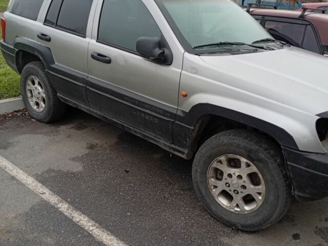 Серый Джип Гранд Чероки, объемом двигателя 3 л и пробегом 350 тыс. км за 1800 $, фото 1 на Automoto.ua