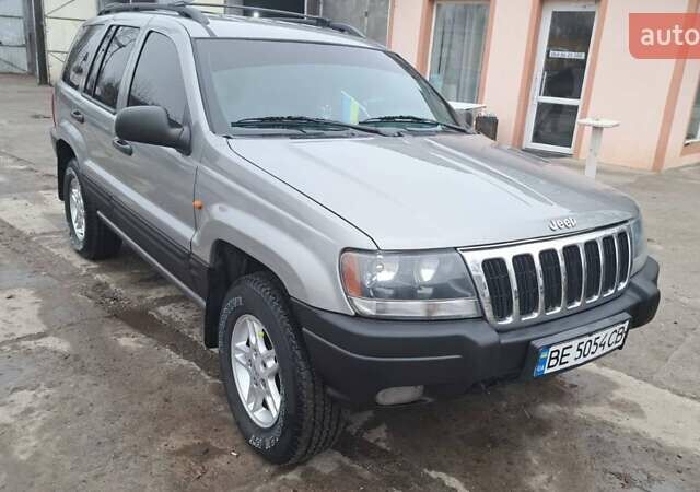 Сірий Джип Grand Cherokee, об'ємом двигуна 3.12 л та пробігом 320 тис. км за 7000 $, фото 1 на Automoto.ua