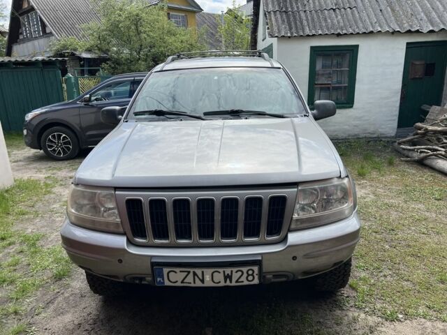 Сірий Джип Grand Cherokee, об'ємом двигуна 3.1 л та пробігом 200 тис. км за 4565 $, фото 1 на Automoto.ua