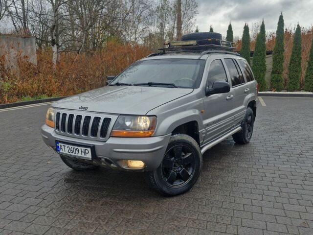 Сірий Джип Grand Cherokee, об'ємом двигуна 4.7 л та пробігом 321 тис. км за 6300 $, фото 1 на Automoto.ua