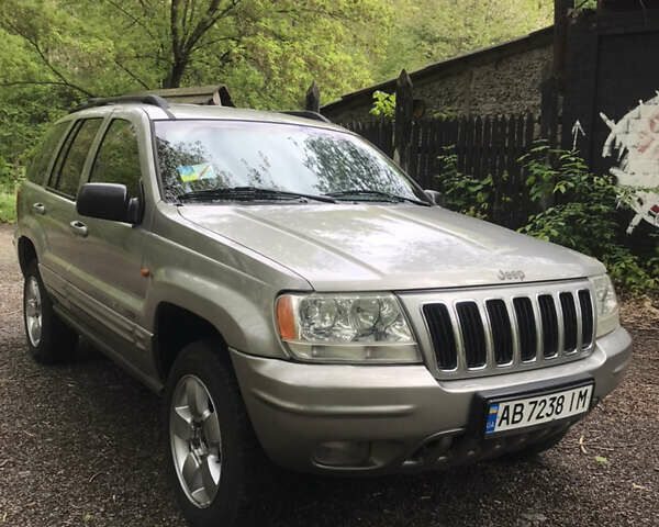 Сірий Джип Grand Cherokee, об'ємом двигуна 3.2 л та пробігом 215 тис. км за 7500 $, фото 1 на Automoto.ua