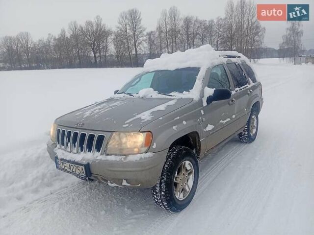 Серый Джип Гранд Чероки, объемом двигателя 2.69 л и пробегом 291 тыс. км за 3450 $, фото 1 на Automoto.ua