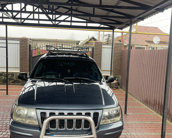 Серый Джип Гранд Чероки, объемом двигателя 2.7 л и пробегом 231 тыс. км за 9500 $, фото 1 на Automoto.ua