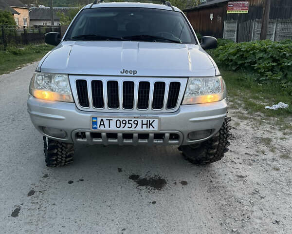 Сірий Джип Grand Cherokee, об'ємом двигуна 2.69 л та пробігом 250 тис. км за 9700 $, фото 1 на Automoto.ua