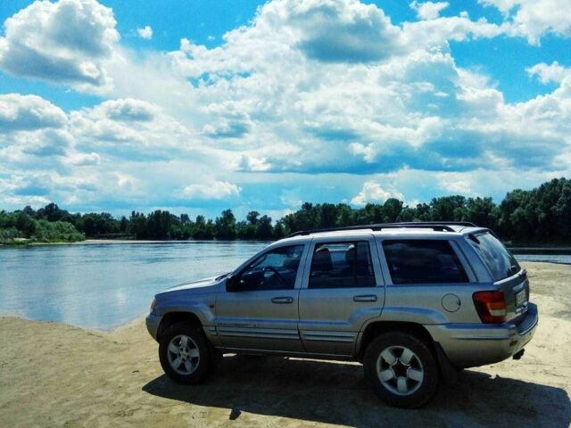 Сірий Джип Grand Cherokee, об'ємом двигуна 4.7 л та пробігом 323 тис. км за 7200 $, фото 1 на Automoto.ua