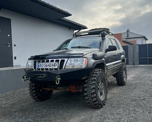 Сірий Джип Grand Cherokee, об'ємом двигуна 4.7 л та пробігом 100 тис. км за 12000 $, фото 1 на Automoto.ua