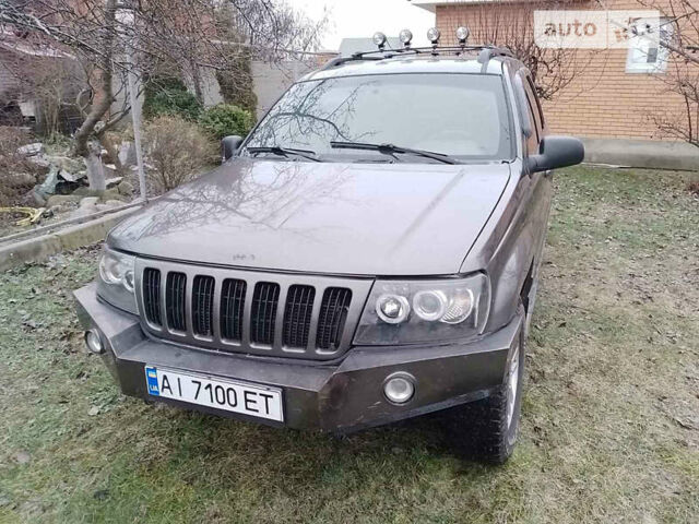 Сірий Джип Grand Cherokee, об'ємом двигуна 4.7 л та пробігом 150 тис. км за 6100 $, фото 1 на Automoto.ua