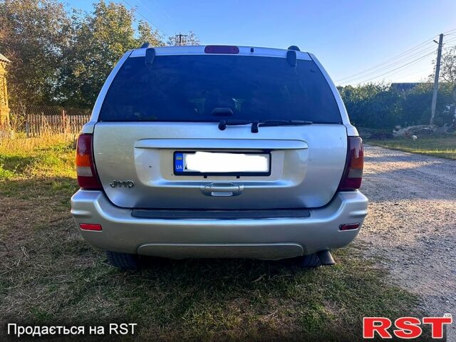 Сірий Джип Grand Cherokee, об'ємом двигуна 2.7 л та пробігом 331 тис. км за 9200 $, фото 1 на Automoto.ua