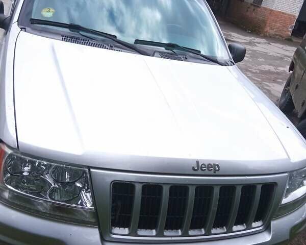 Серый Джип Гранд Чероки, объемом двигателя 2.7 л и пробегом 137 тыс. км за 5200 $, фото 1 на Automoto.ua