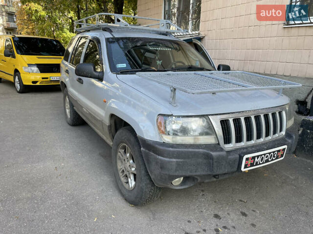 Серый Джип Гранд Чероки, объемом двигателя 2.7 л и пробегом 250 тыс. км за 5000 $, фото 1 на Automoto.ua