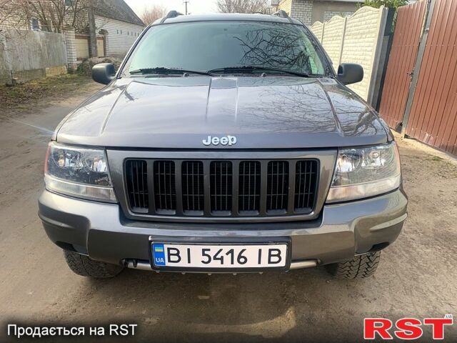 Сірий Джип Grand Cherokee, об'ємом двигуна 2.7 л та пробігом 270 тис. км за 9500 $, фото 1 на Automoto.ua