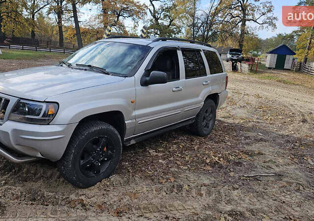 Серый Джип Гранд Чероки, объемом двигателя 2.69 л и пробегом 440 тыс. км за 5000 $, фото 1 на Automoto.ua