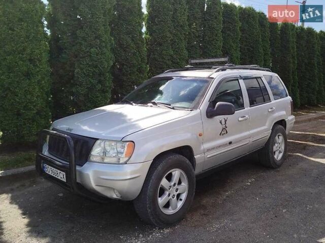 Сірий Джип Grand Cherokee, об'ємом двигуна 2.69 л та пробігом 438 тис. км за 8500 $, фото 1 на Automoto.ua