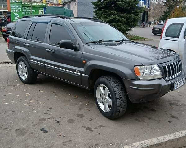 Серый Джип Гранд Чероки, объемом двигателя 2.69 л и пробегом 290 тыс. км за 7500 $, фото 1 на Automoto.ua