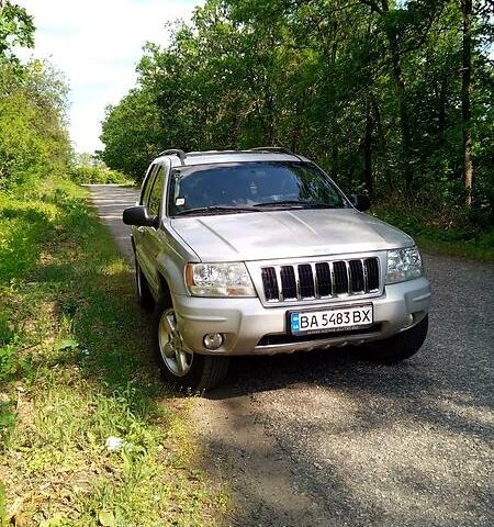 Сірий Джип Grand Cherokee, об'ємом двигуна 2.7 л та пробігом 289 тис. км за 10000 $, фото 1 на Automoto.ua