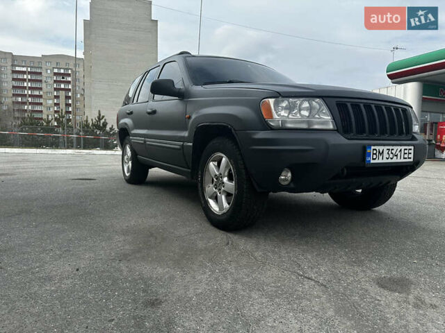 Сірий Джип Grand Cherokee, об'ємом двигуна 2.69 л та пробігом 300 тис. км за 11200 $, фото 1 на Automoto.ua