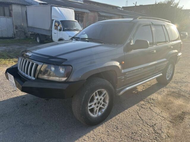 Сірий Джип Grand Cherokee, об'ємом двигуна 4 л та пробігом 265 тис. км за 2700 $, фото 1 на Automoto.ua