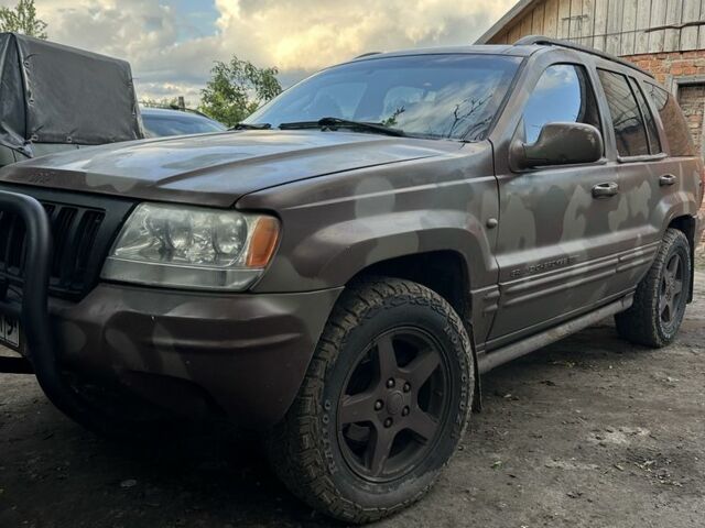 Сірий Джип Grand Cherokee, об'ємом двигуна 2.7 л та пробігом 525 тис. км за 5600 $, фото 1 на Automoto.ua