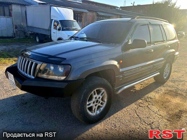 Сірий Джип Grand Cherokee, об'ємом двигуна 4 л та пробігом 274 тис. км за 2700 $, фото 1 на Automoto.ua