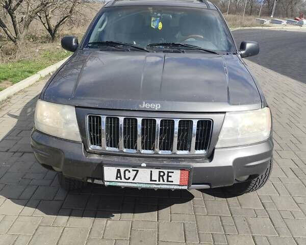 Сірий Джип Grand Cherokee, об'ємом двигуна 2.69 л та пробігом 236 тис. км за 4100 $, фото 1 на Automoto.ua