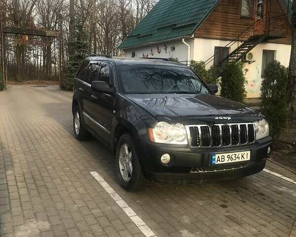 Серый Джип Гранд Чероки, объемом двигателя 4.7 л и пробегом 197 тыс. км за 8990 $, фото 1 на Automoto.ua