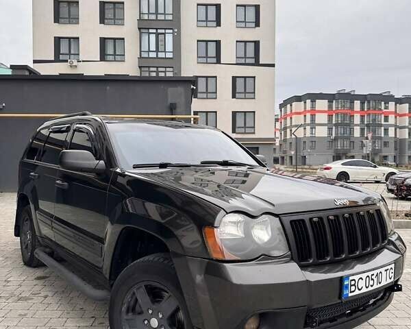 Сірий Джип Grand Cherokee, об'ємом двигуна 4.7 л та пробігом 200 тис. км за 8500 $, фото 1 на Automoto.ua