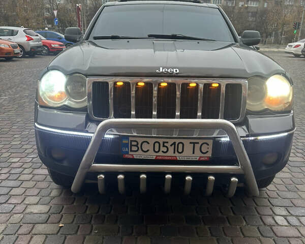 Серый Джип Гранд Чероки, объемом двигателя 4.7 л и пробегом 190 тыс. км за 8777 $, фото 1 на Automoto.ua