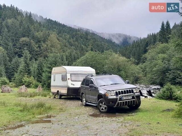 Сірий Джип Grand Cherokee, об'ємом двигуна 4.7 л та пробігом 190 тис. км за 8600 $, фото 1 на Automoto.ua