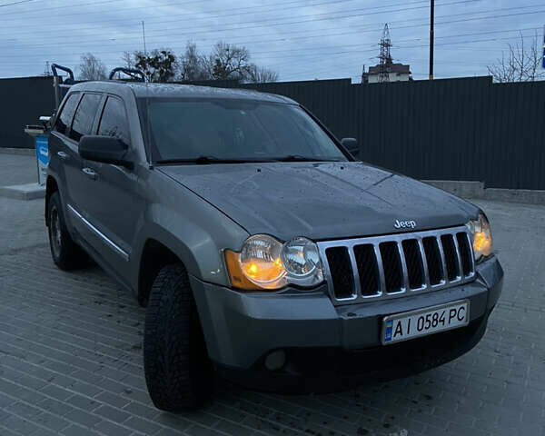 Сірий Джип Grand Cherokee, об'ємом двигуна 3.7 л та пробігом 245 тис. км за 8399 $, фото 1 на Automoto.ua