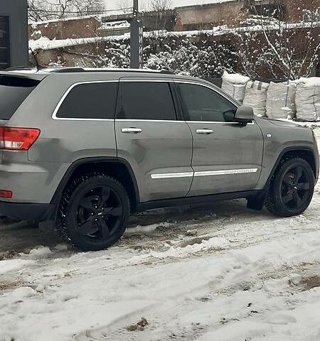 Сірий Джип Grand Cherokee, об'ємом двигуна 3 л та пробігом 230 тис. км за 18700 $, фото 1 на Automoto.ua