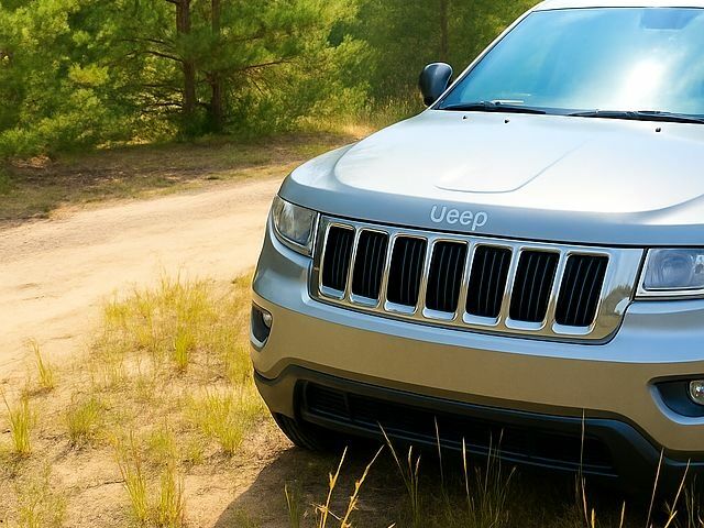 Сірий Джип Grand Cherokee, об'ємом двигуна 3 л та пробігом 254 тис. км за 16000 $, фото 1 на Automoto.ua