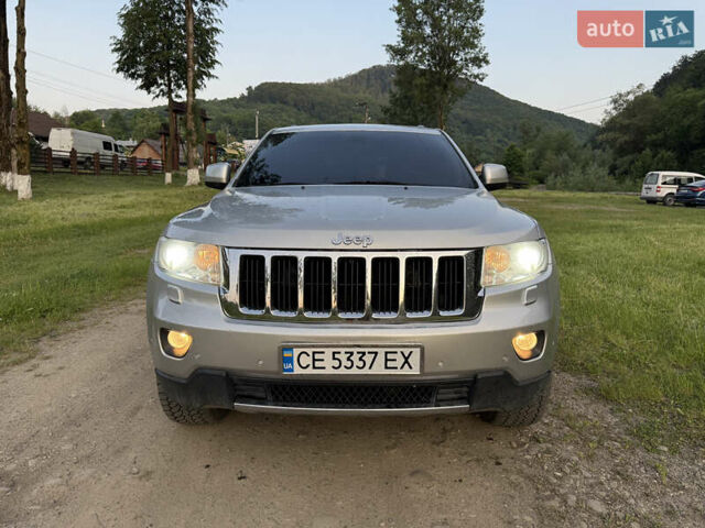 Сірий Джип Grand Cherokee, об'ємом двигуна 2.99 л та пробігом 244 тис. км за 15000 $, фото 1 на Automoto.ua