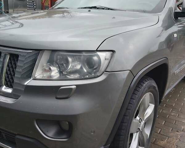 Сірий Джип Grand Cherokee, об'ємом двигуна 2.99 л та пробігом 390 тис. км за 16000 $, фото 1 на Automoto.ua