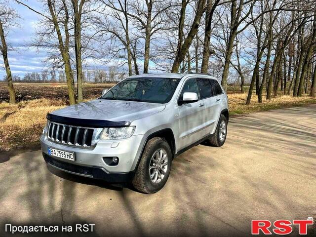 Сірий Джип Grand Cherokee, об'ємом двигуна 3 л та пробігом 0 тис. км за 19999 $, фото 1 на Automoto.ua