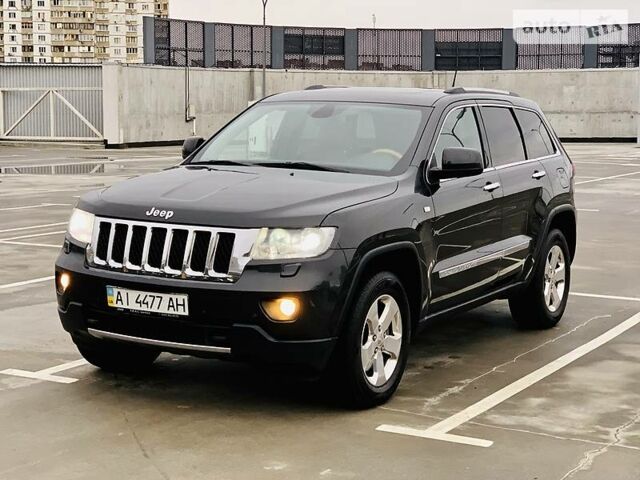 Сірий Джип Grand Cherokee, об'ємом двигуна 3 л та пробігом 112 тис. км за 23200 $, фото 1 на Automoto.ua