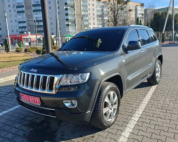 Сірий Джип Grand Cherokee, об'ємом двигуна 3 л та пробігом 225 тис. км за 19999 $, фото 1 на Automoto.ua