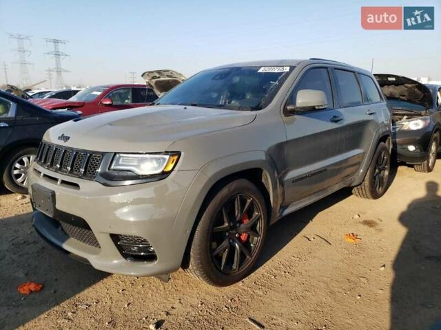 Сірий Джип Grand Cherokee, об'ємом двигуна 6.4 л та пробігом 16 тис. км за 23000 $, фото 1 на Automoto.ua