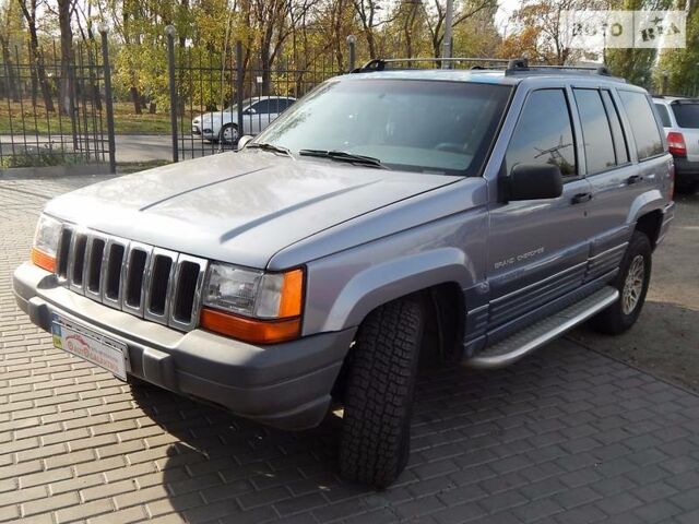 Сірий Джип Grand Cherokee, об'ємом двигуна 4 л та пробігом 335 тис. км за 4800 $, фото 1 на Automoto.ua