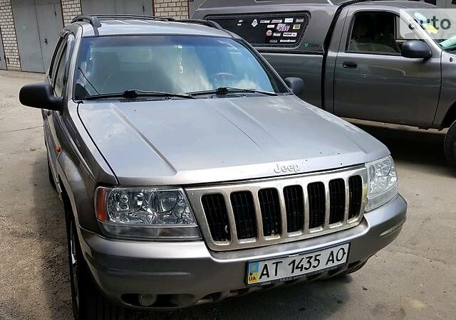 Сірий Джип Grand Cherokee, об'ємом двигуна 4.7 л та пробігом 295 тис. км за 7500 $, фото 1 на Automoto.ua