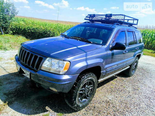 Сірий Джип Grand Cherokee, об'ємом двигуна 4.7 л та пробігом 455 тис. км за 6400 $, фото 1 на Automoto.ua