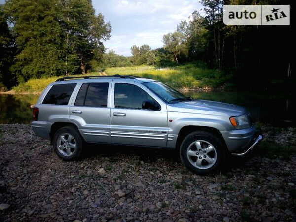 Сірий Джип Grand Cherokee, об'ємом двигуна 2.7 л та пробігом 245 тис. км за 11500 $, фото 1 на Automoto.ua