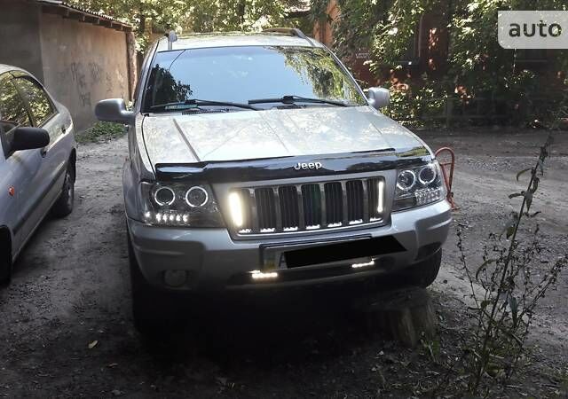 Сірий Джип Grand Cherokee, об'ємом двигуна 2.7 л та пробігом 182 тис. км за 13999 $, фото 1 на Automoto.ua