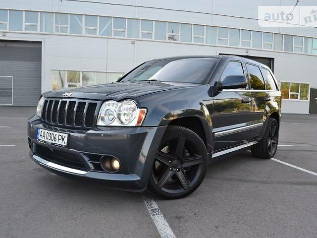 Сірий Джип Grand Cherokee, об'ємом двигуна 6.1 л та пробігом 82 тис. км за 22999 $, фото 1 на Automoto.ua