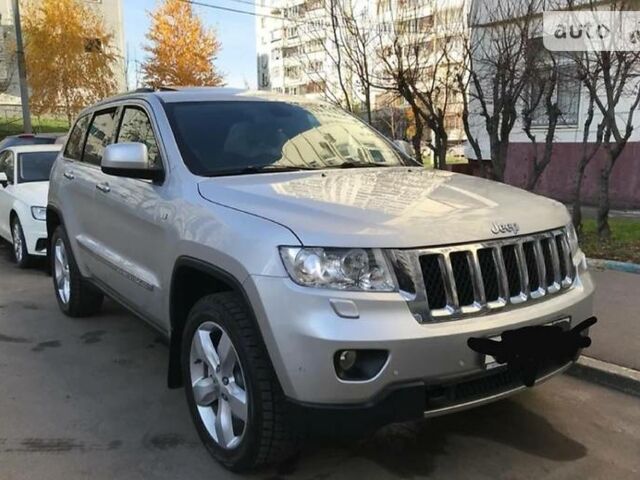 Сірий Джип Grand Cherokee, об'ємом двигуна 3 л та пробігом 140 тис. км за 16000 $, фото 1 на Automoto.ua