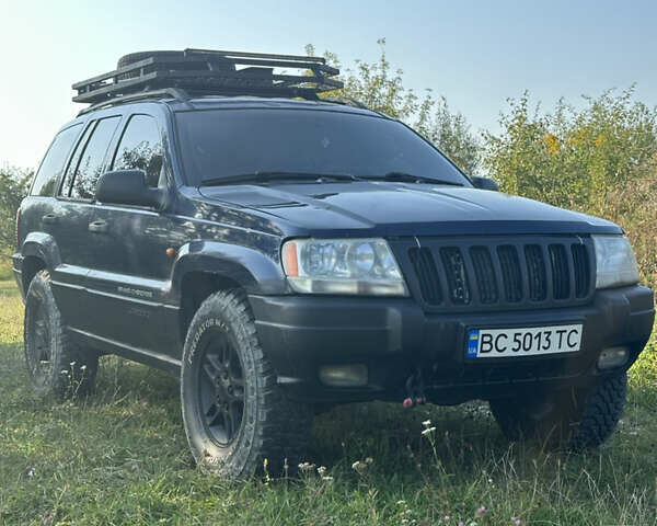 Синій Джип Grand Cherokee, об'ємом двигуна 2.69 л та пробігом 289 тис. км за 10000 $, фото 1 на Automoto.ua