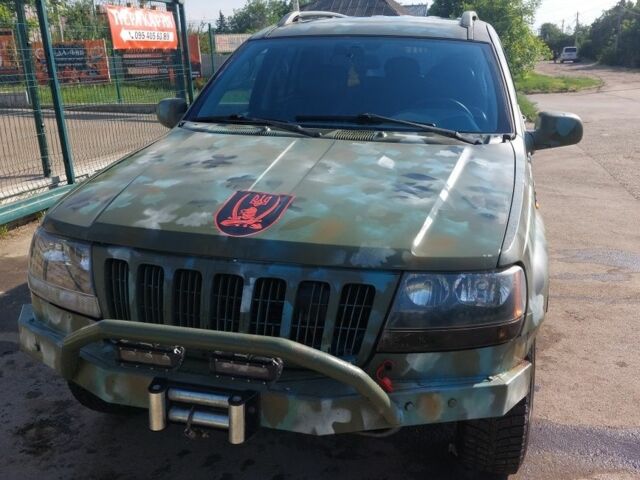 Синій Джип Grand Cherokee, об'ємом двигуна 2.7 л та пробігом 304 тис. км за 5800 $, фото 1 на Automoto.ua