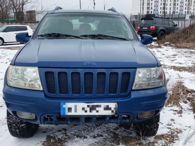 Синий Джип Гранд Чероки, объемом двигателя 2.7 л и пробегом 251 тыс. км за 5000 $, фото 1 на Automoto.ua
