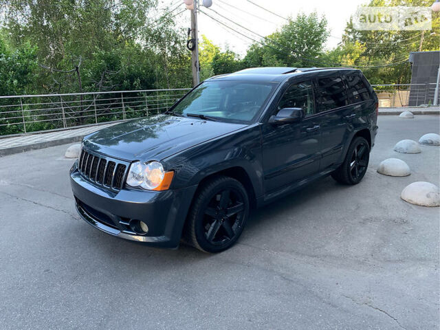 Синій Джип Grand Cherokee, об'ємом двигуна 6.1 л та пробігом 158 тис. км за 20400 $, фото 1 на Automoto.ua